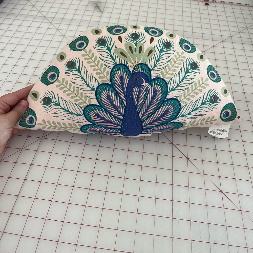 Half-circle shaped Peacock accent pillow